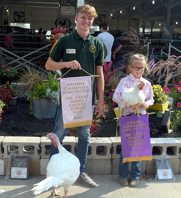 Grand and Reserve Champion Overall Meat Entry Go In Opposite Directions